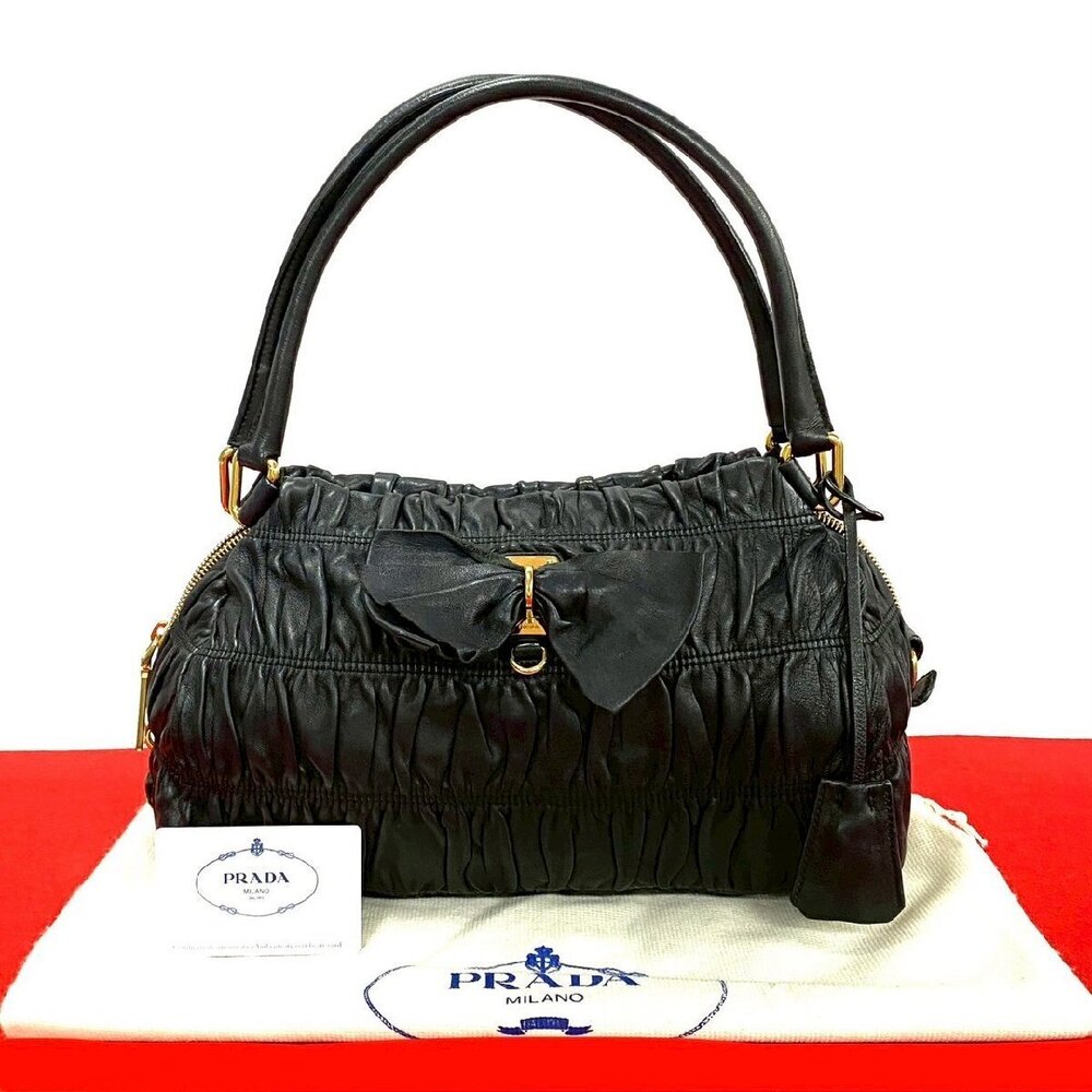 Prada ribbon motif leather gathered semi shoulder black